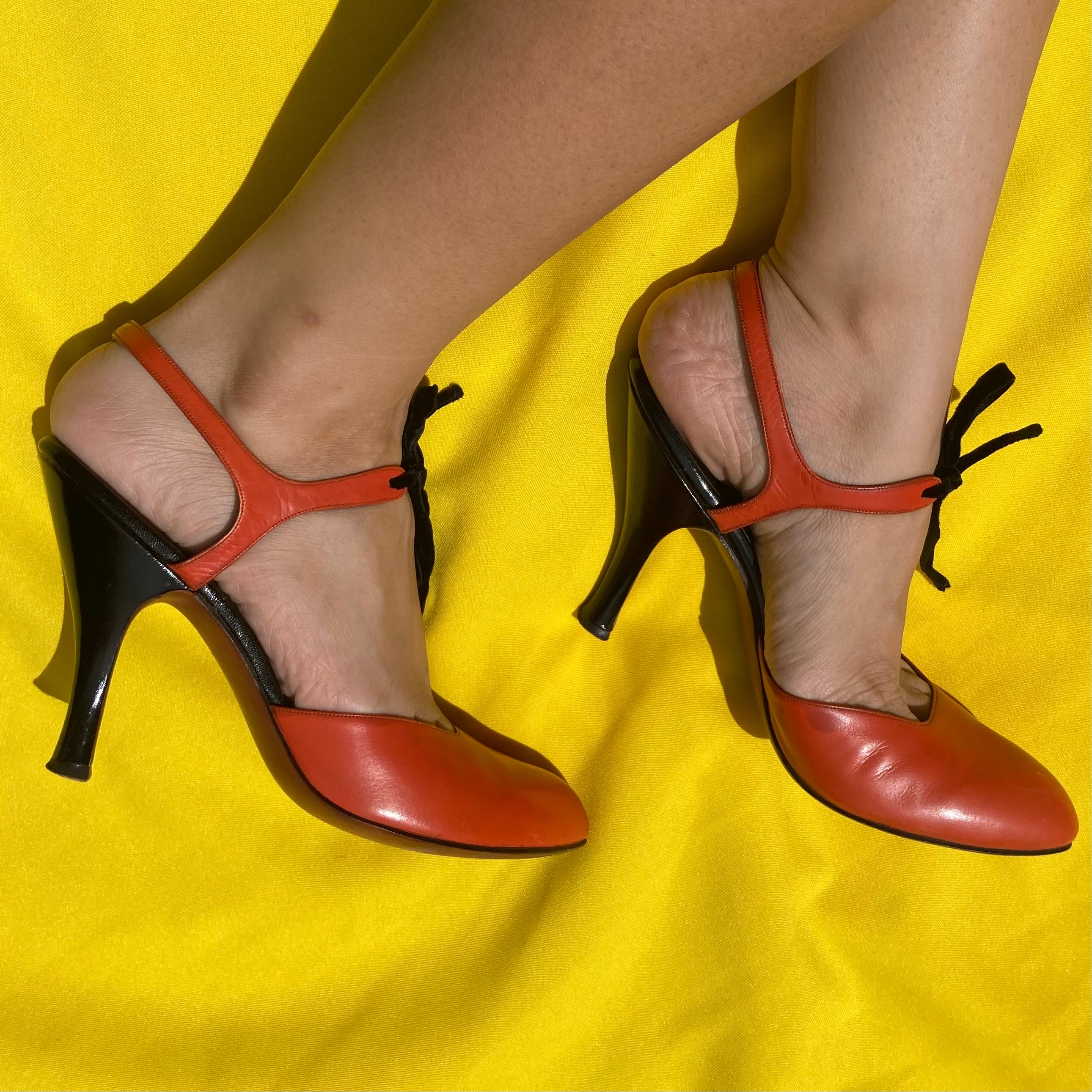Vintage orange and black Neiman Marcus kitten heels
